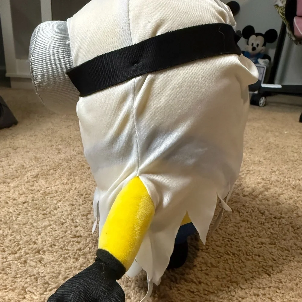 Minion plush toy dressed as a ghost for Halloween